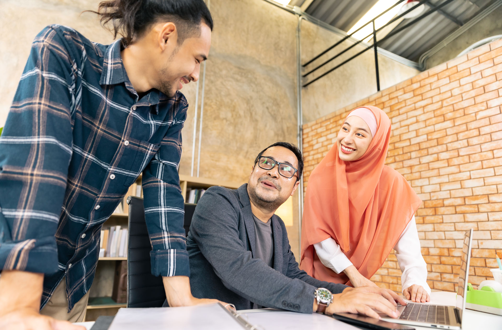 CMX People team members in Kuala Lumpur - inclusive and diverse workplace culture